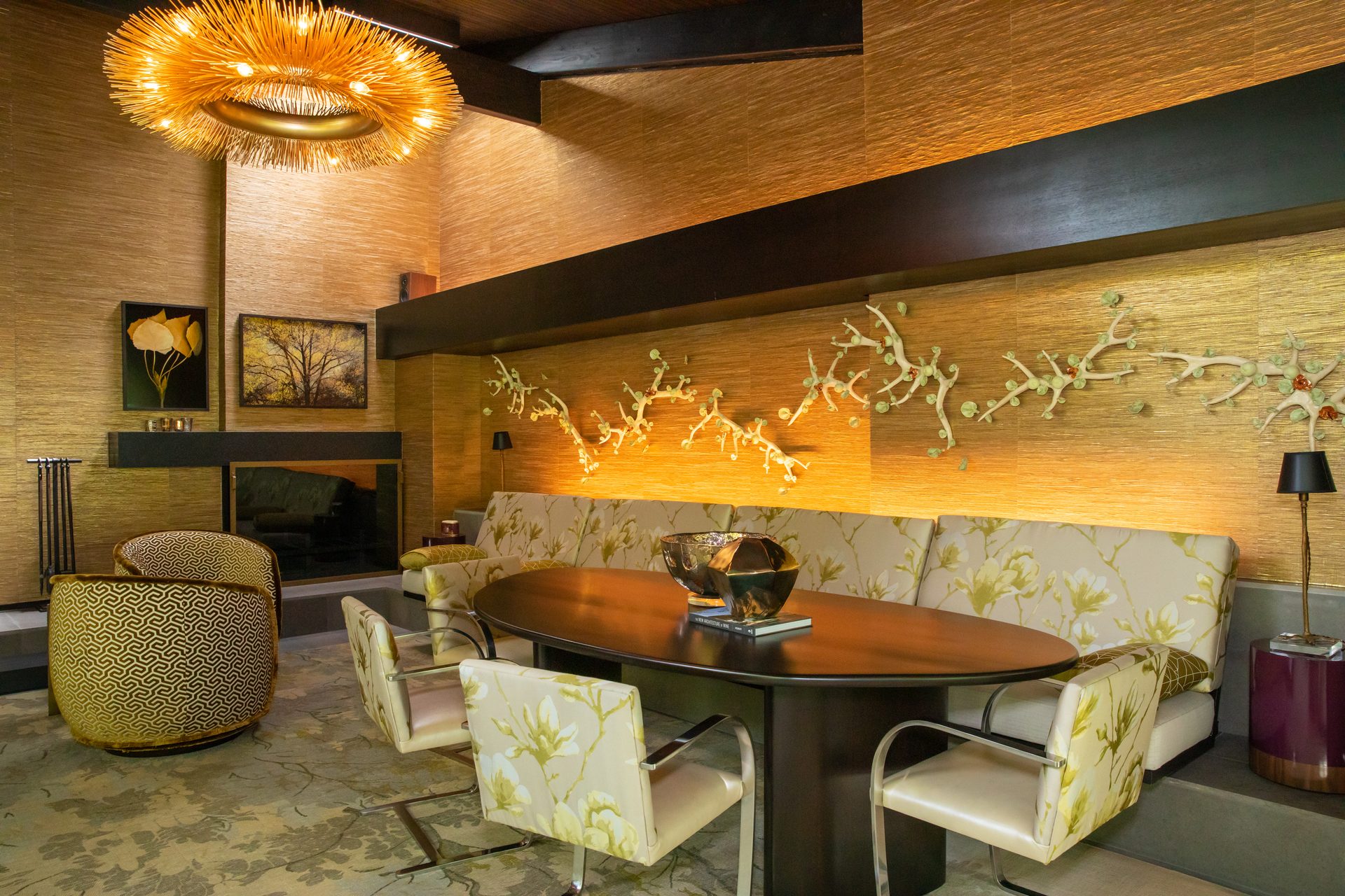 Dining area beneath sculptural lighting in a River Oaks mid-century modern home by Media Systems