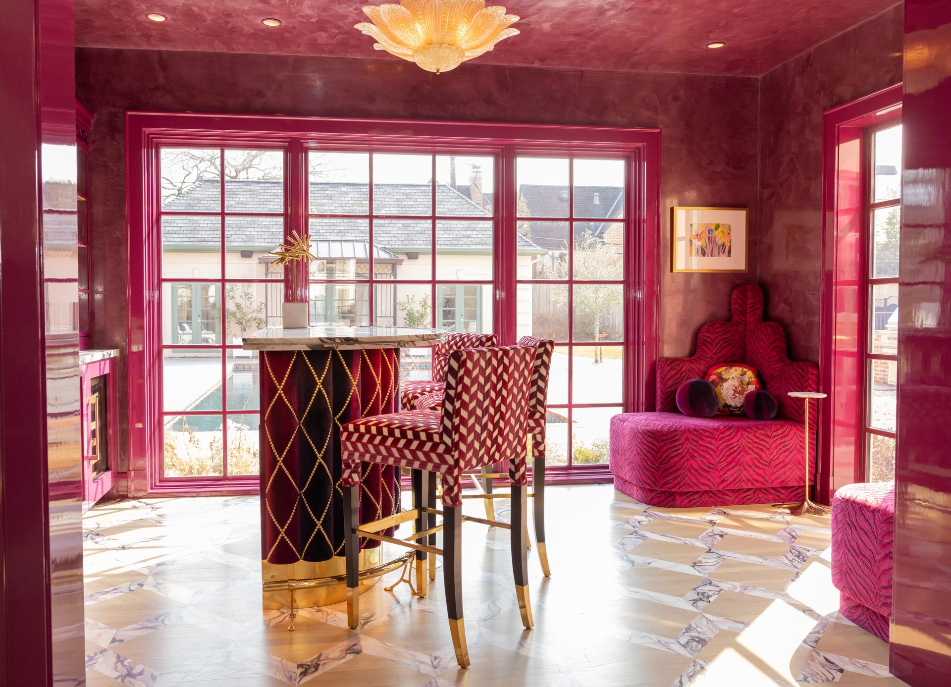 Jewel toned breakfast room with natural light at The Redbird House in River Oaks
