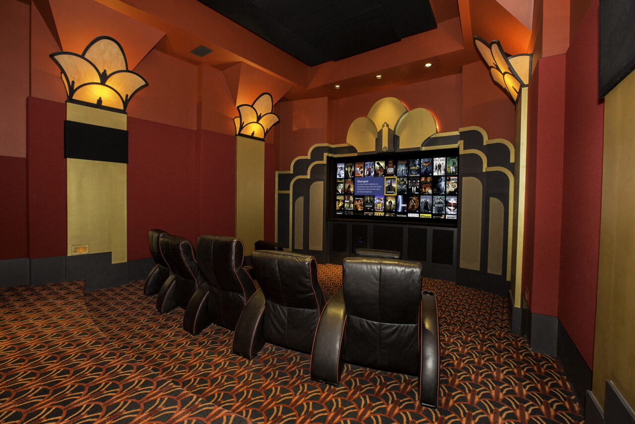 Media Systems home theater with art deco design and integrated seating